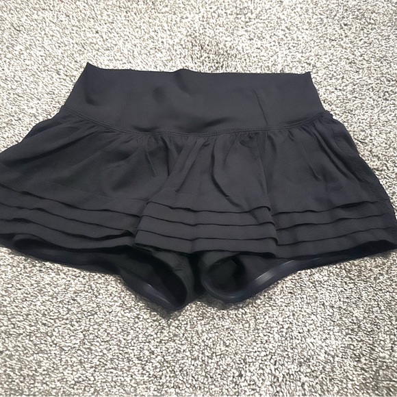 Lululemon tennis skirt with built in biker shorts. - Picture 1 of 3